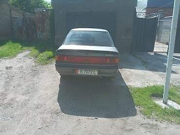 ремонт чемодана: Mazda 323: 1989 г., Механика, Бензин, Седан — 1