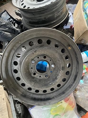 штампованые диски: Железные Диски R 15 BMW, отверстий - 4, Новый — 1