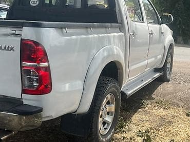 Транспорт: Toyota Hilux: 2014 г., 2.7 л, Механика, Бензин, Пикап — 2