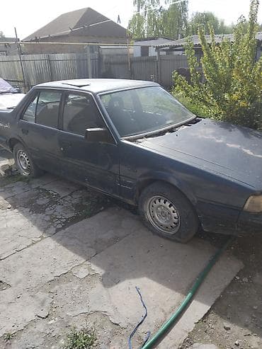 мазда 323 седан: Mazda 626: 1987 г. — 4
