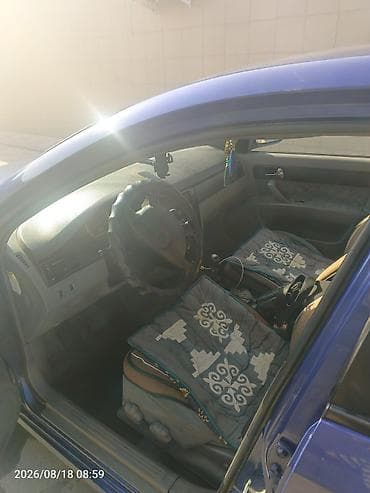 подсветка глушителя: Chevrolet Lacetti: 2003 г., 1.6 л, Механика, Бензин, Седан — 7