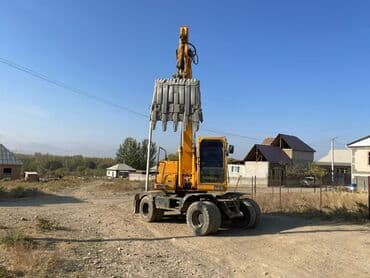 покрышка на погрузчик цена: Экскаватор, Колесный — 5