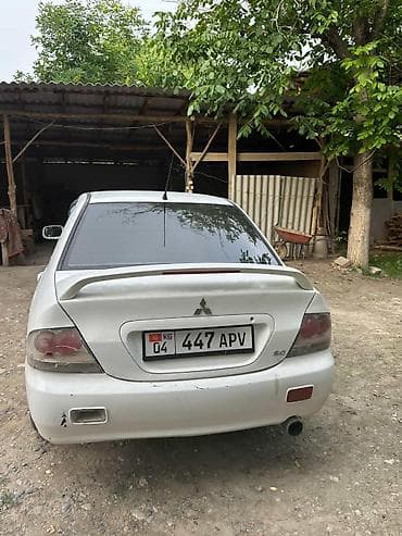 lexsus lx 470: Mitsubishi Lancer: 2005 г., Механика, Бензин, Седан — 4