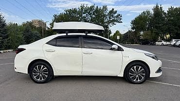 byd e7: Toyota Corolla: 2019 г., 1.8 л, Гибрид — 2