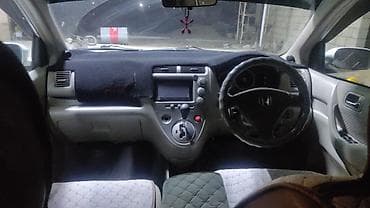 рул: Honda Civic: 2003 г., Вариатор, Бензин, Универсал — 4
