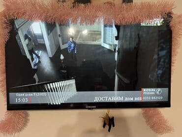 led: Телевизор Samsung LED, диагональ примерно 32–40". Плоская панель с — 1