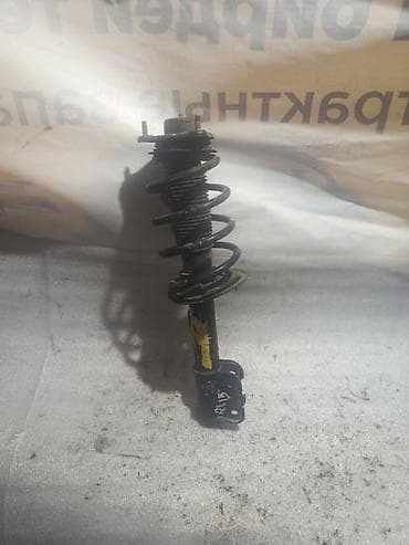 Передний амортизатор Hyundai 2009 г.