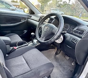 бампер 323f: Toyota Corolla: 2003 г., 1.5 л, Автомат, Бензин, Хэтчбэк — 9