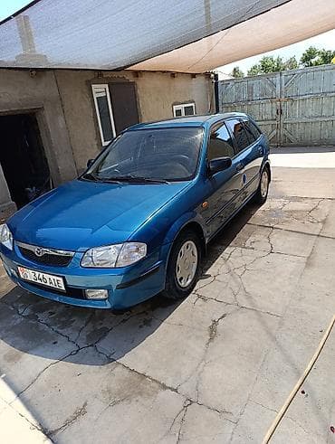каропка на мазда: Mazda 323: 1999 г., 1.5 л, Автомат, Бензин, Универсал — 2