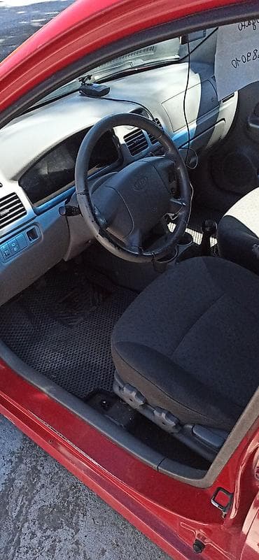 Транспорт: Kia Rio: 2005 г., 1.3 л, Кол менен иштөөчү, Бензин, Универсал — 7
