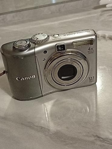 power: Цифровой фотоаппарат Canon PowerShot A1100 IS (серебристый) Ключевые — 2