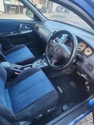 Продажа авто: Mazda Familia: 2002 г., 1.5 л, Автомат, Бензин, Хэтчбэк — 1