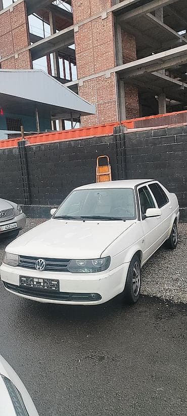 Транспорт: Volkswagen Jetta: 2012 г., 1.6 л, Механика, Бензин, Седан — 4