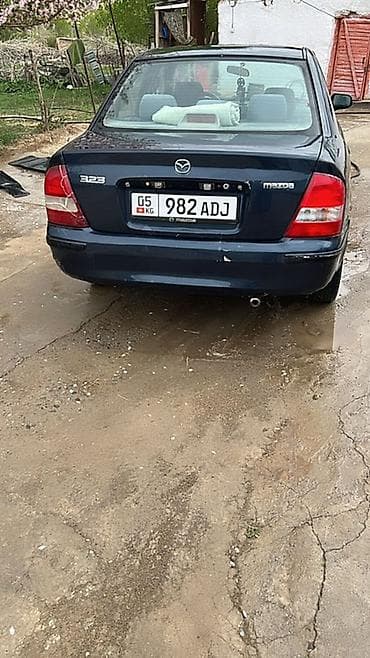 Mazda 323: 1998 г., 1.6 л, Механика, Бензин, Седан