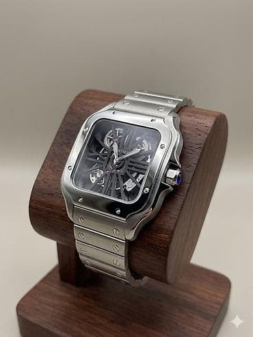 саат: Часы с открытым скелетонизированным механизмом в стиле Santos. - — 1