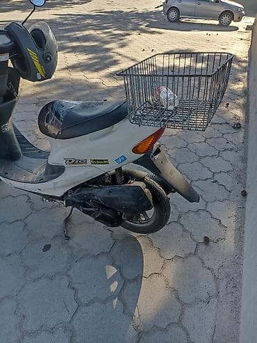 Унаа: Скутер Honda Dio (серия AF), 2-тактный городской скутер. Основные — 4