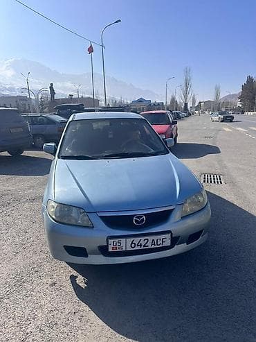 kia optima k5: Mazda Familia: 2001 г., 1.6 л, Ручные, Бензин, Универсал — 4
