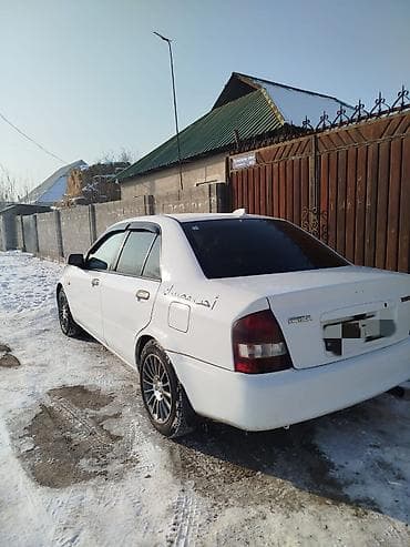 mazda 323 авто: Mazda Familia: 2001 г., 1.3 л, Автомат, Бензин, Седан — 6