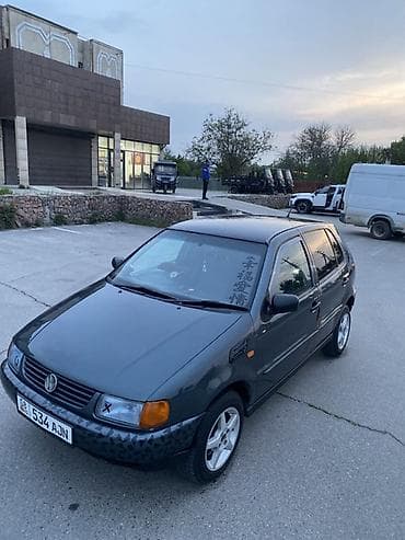 боковой тырмо: Volkswagen Polo: 1999 г., 1.6 л, Автомат, Бензин, Хэтчбэк — 3