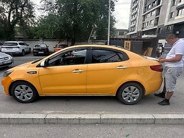 s 65: Аренда автомобиля для такси — Kia Rio (седан), желтый цвет Прописка — 1