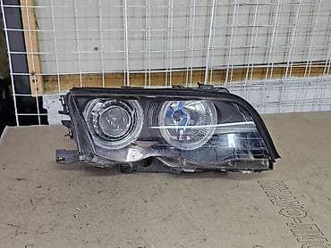 Автозапчасти: Передняя правая фара BMW 2000 г., Б/у — 1