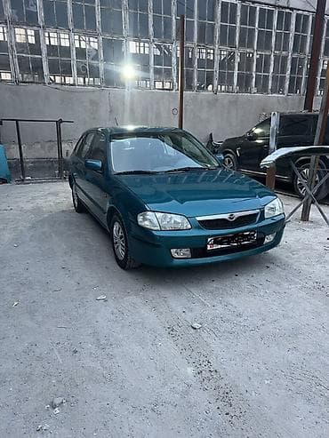 Mazda 323: 1999 г., 1.5 л, Автомат, Бензин, Хэтчбэк — 5
