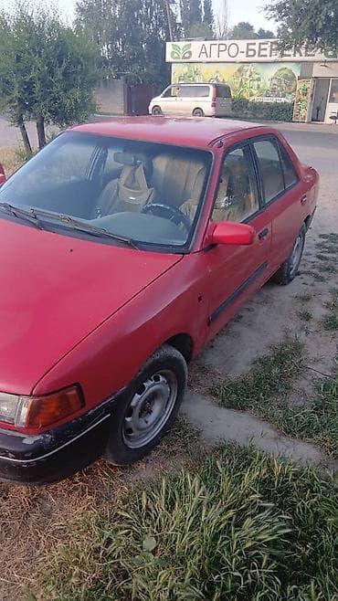 lexus es 2003: Mazda 323: 1993 г., 1.6 л, Механика, Бензин, Седан — 2