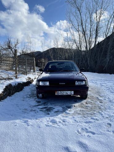 двухместная машина: Toyota Carina II — салон и интерьер - Руль с надписью Carina II — 10