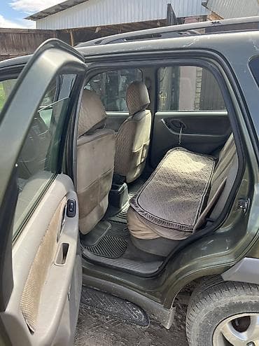 Mazda Tribute: 2002 г., 2 л, Механика, Бензин, Кроссовер — 10
