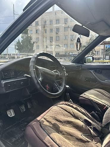 мицубиси спец стар: Toyota Carina: 1989 г., 1.6 л, Механика, Бензин, Хэтчбэк — 7