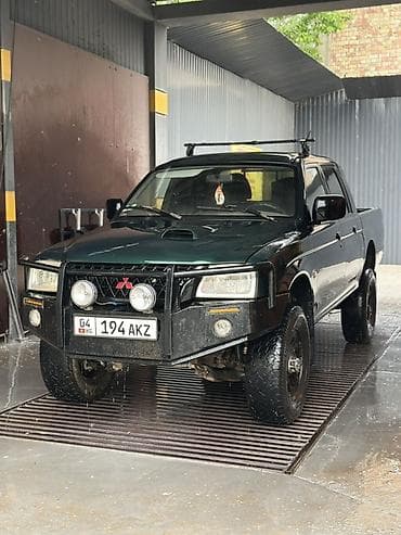 шины lt: Mitsubishi L200: 2002 г., 2.5 л, Механика, Бензин, Пикап — 1