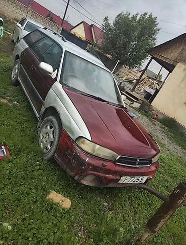 выхлоп sti: Subaru Legacy: 1994 г., 2 л, Вариатор, Бензин, Универсал — 1