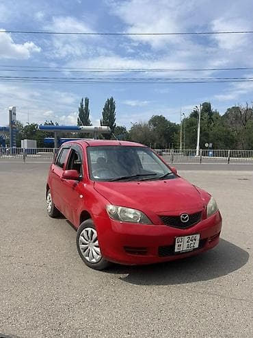 Mazda Demio: 2003 г., 1.3 л, Автомат, Бензин, Хэтчбэк — 2