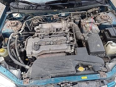 mazda 121: Mazda 323: 1999 г., 1.5 л, Ручные, Бензин, Хэтчбэк — 1