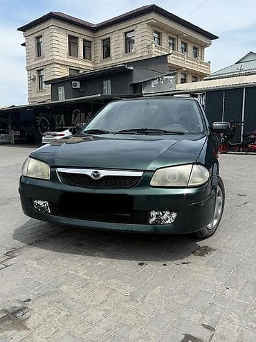 mazda demio решотка: Mazda 323: 2000 г., 1.5 л, Автомат, Бензин, Хэтчбэк — 5