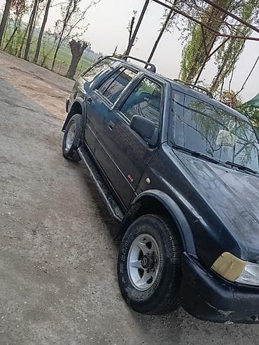 такта вокси: Внедорожник 4x4, черный, 5‑дверный кузов. Основные особенности: - — 4