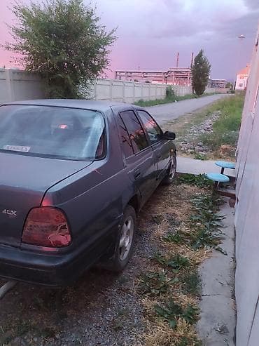 Транспорт: Nissan Sunny: 1991 г., 1.4 л, Механика, Бензин, Седан — 4