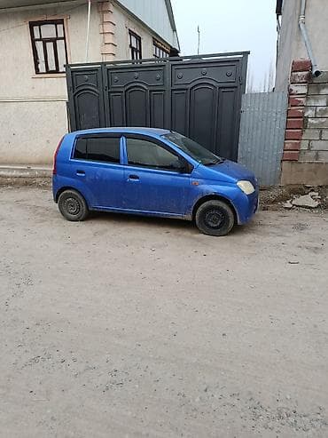 гур на нива: Daihatsu Cuore: 2003 г., Хэтчбэк — 1