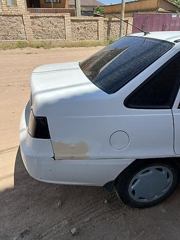 хундай аванте 1: Daewoo Nexia: 2012 г., Кол менен иштөөчү, Седан — 7