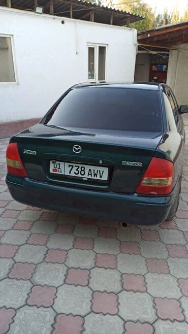 продаю или меняю на дом: Mazda 323: 2000 г., 1.6 л, Механика, Бензиновая, Седан — 7