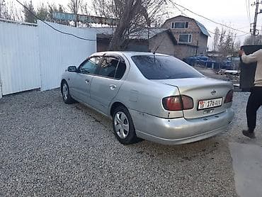 kia rio x line: Nissan Primera: 2000 г., 1.6 л, Механика, Седан — 5