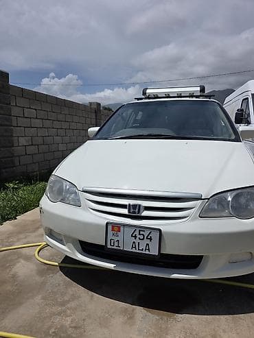 одиссей сиденья: Honda Odyssey: 2000 г., 2.3 л, Автомат, Минивэн — 6