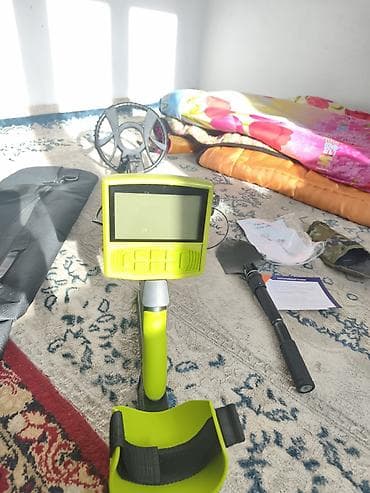 лесу: Металлоискатель с ЖК‑дисплеем и катушкой DD Описание: - Поисковая — 1