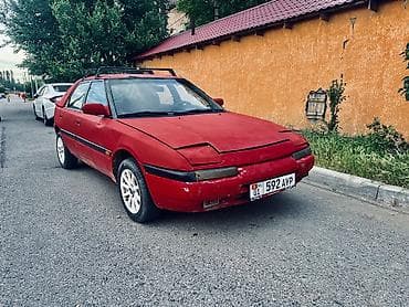 chery arizo: Mazda 323: 1990 г., 1.6 л, Механика, Бензин, Лифтбек — 6