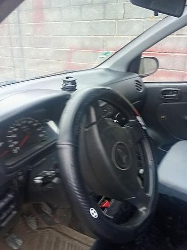 daewoo nexis: Daihatsu Cuore: 2003 г., 1 л, Механика, Бензин, Хэтчбэк — 6