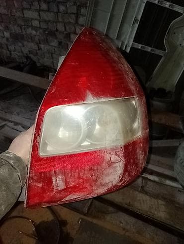 машына хонда фит: Задний фонарь автомобиля (левый). хонда фит — 2
