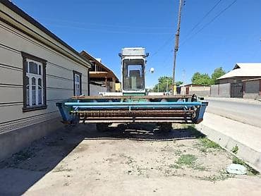 Самоходная косилка (жатка) для заготовки кормов Описание: -