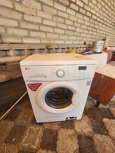 9070 xt: Стиральная машина LG с фронтальной загрузкой - Серия: Direct Drive - — 1