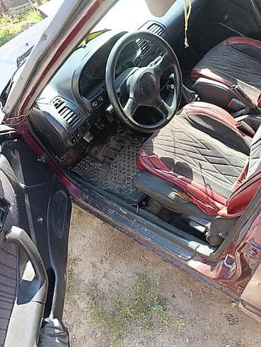 launch pro elite: Mazda 323: 1994 г., 1.6 л, Механика, Седан — 5