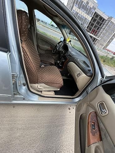 алмеро: Nissan Almera: 2003 г., 1.5 л, Автомат, Бензин, Седан — 9